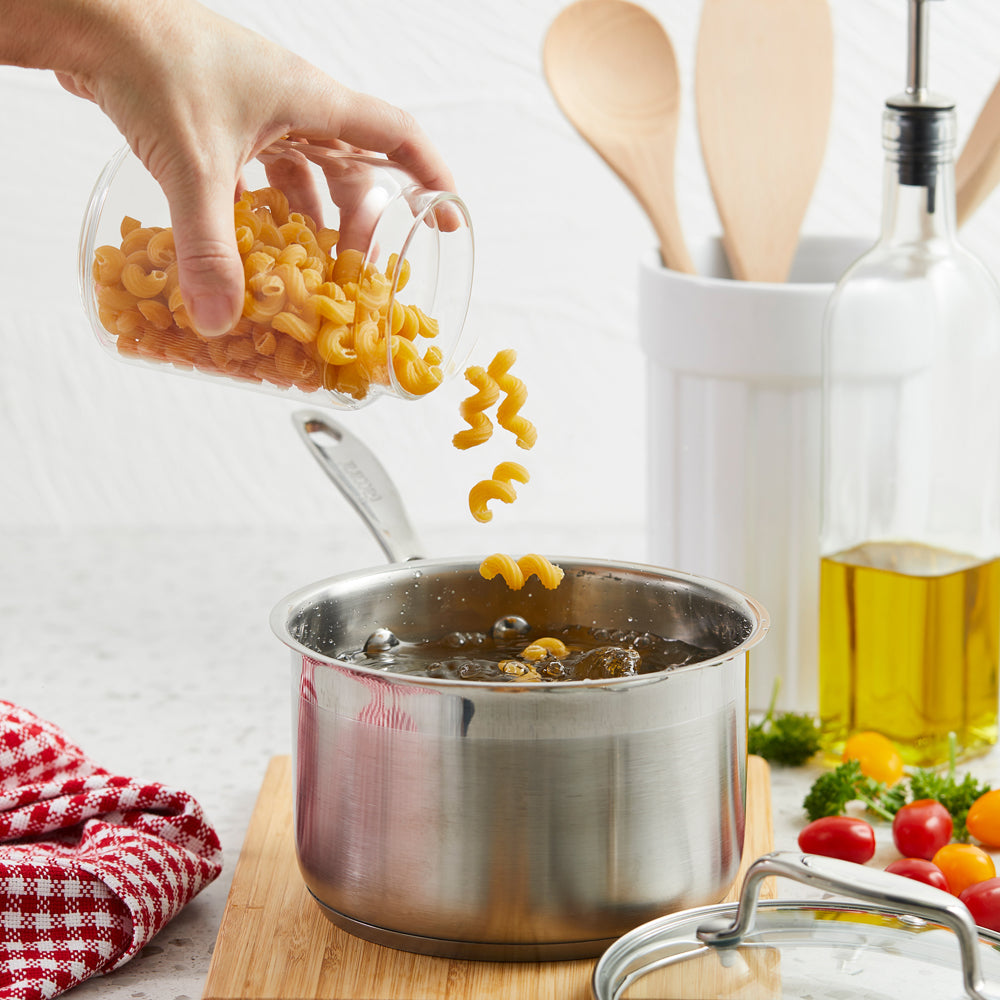 Baccarat iconiX Saucepan with Lid 16cm pasta poured into a saucepan at Robins Kitchen