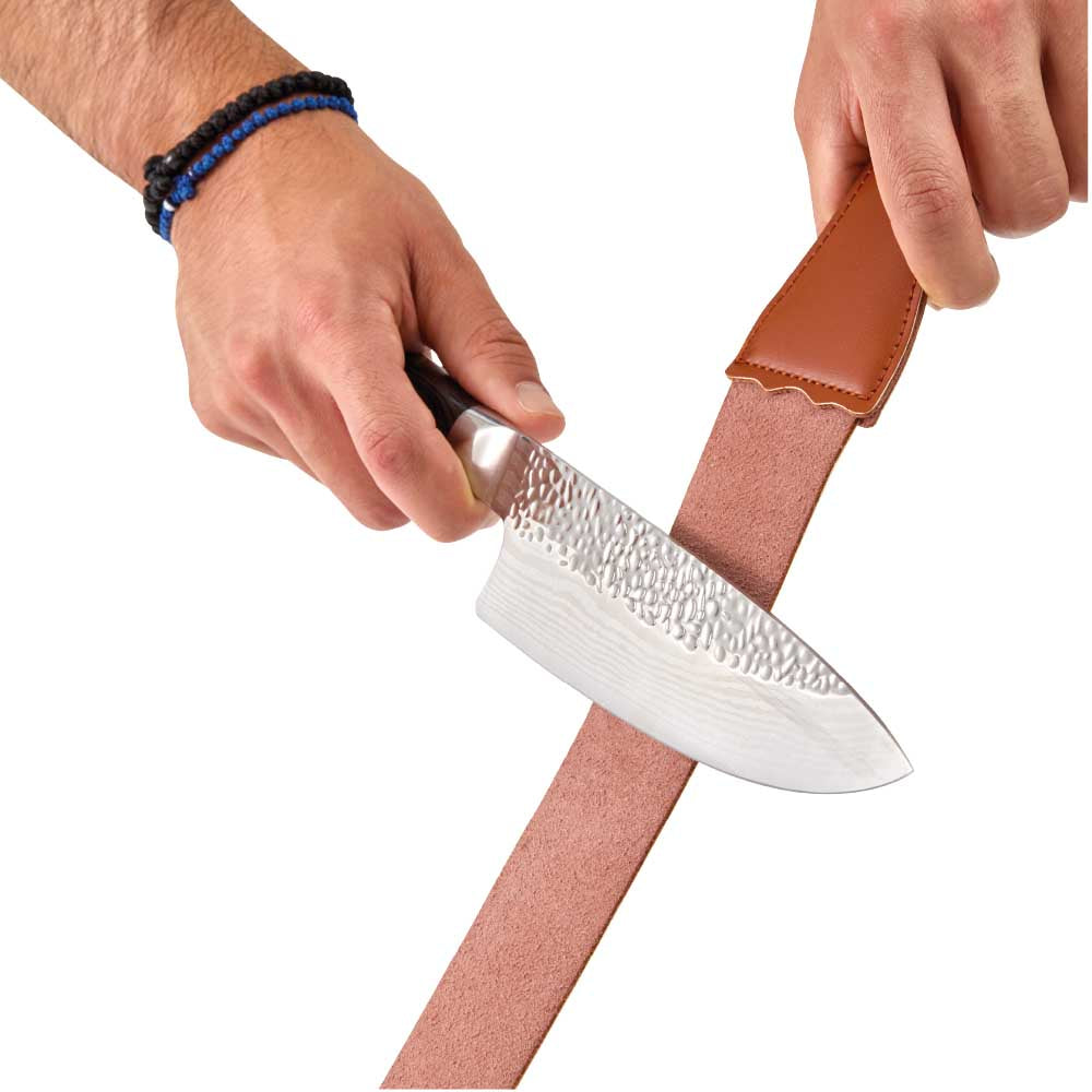 Man sharpening knife with leather strop - Robins Kitchen