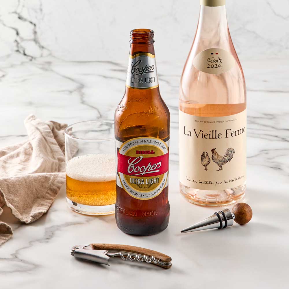 Wood Bottle Opener and Bottle Stopper next to wine & beer - Robins Kitchen