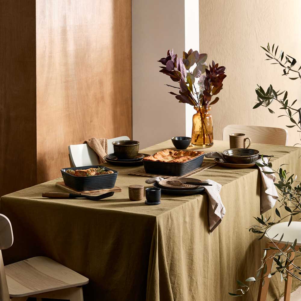 dining setting with moody ribbed rustic dinnerware, bakeware, and kitchenware - Robins Kitchen