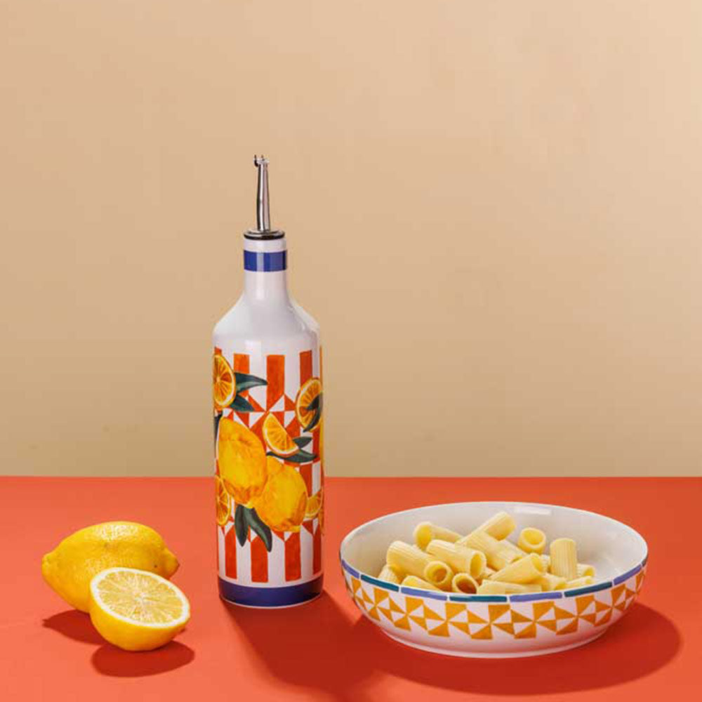 Porto Valentina Round Serving Bowl 32cm next to an oil bottle and lemons at Robins Kitchen
