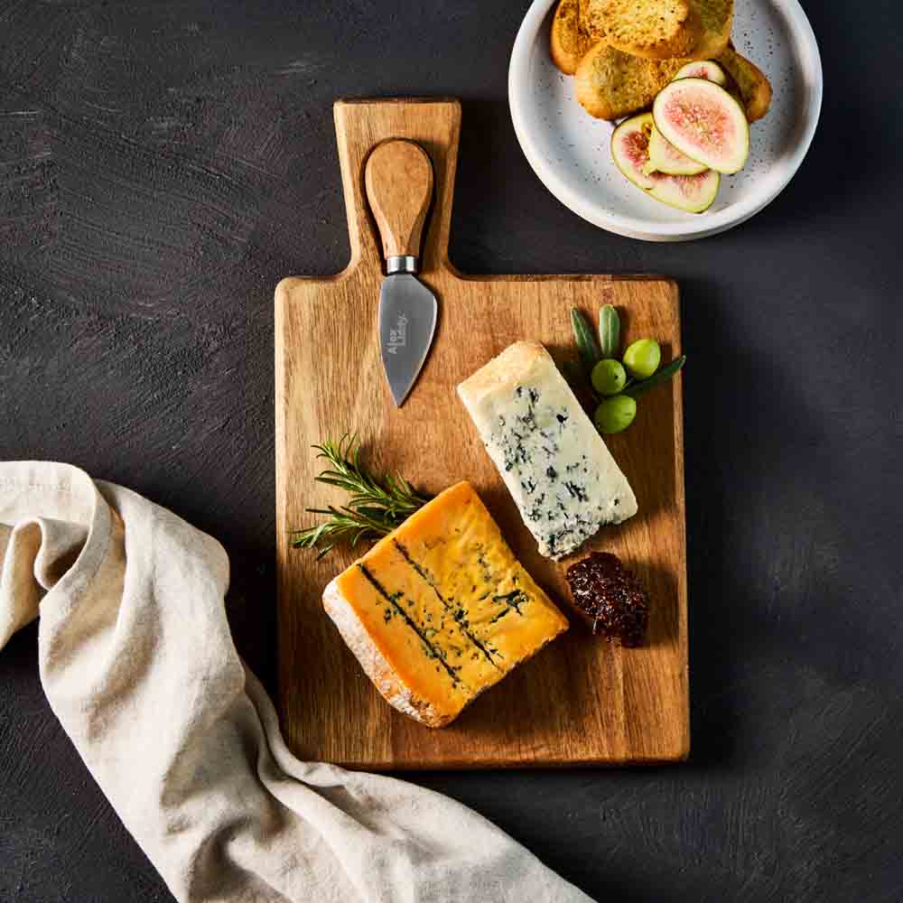 quince paste on cheese board with knife - Robins Kitchen